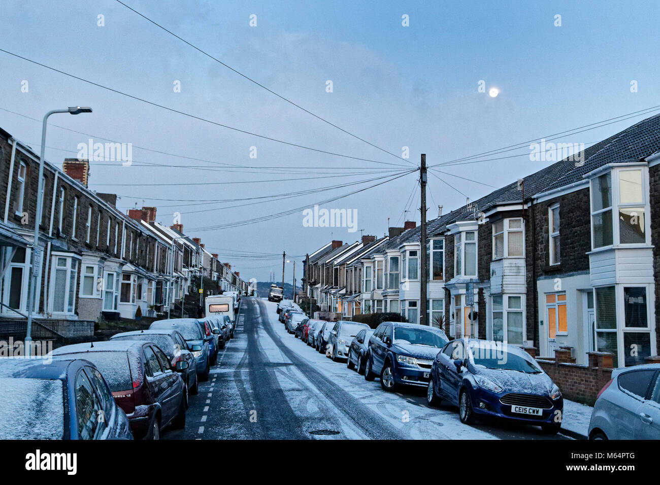 Pictured The lunar phonomenon known as Black Moon is seen over snow
