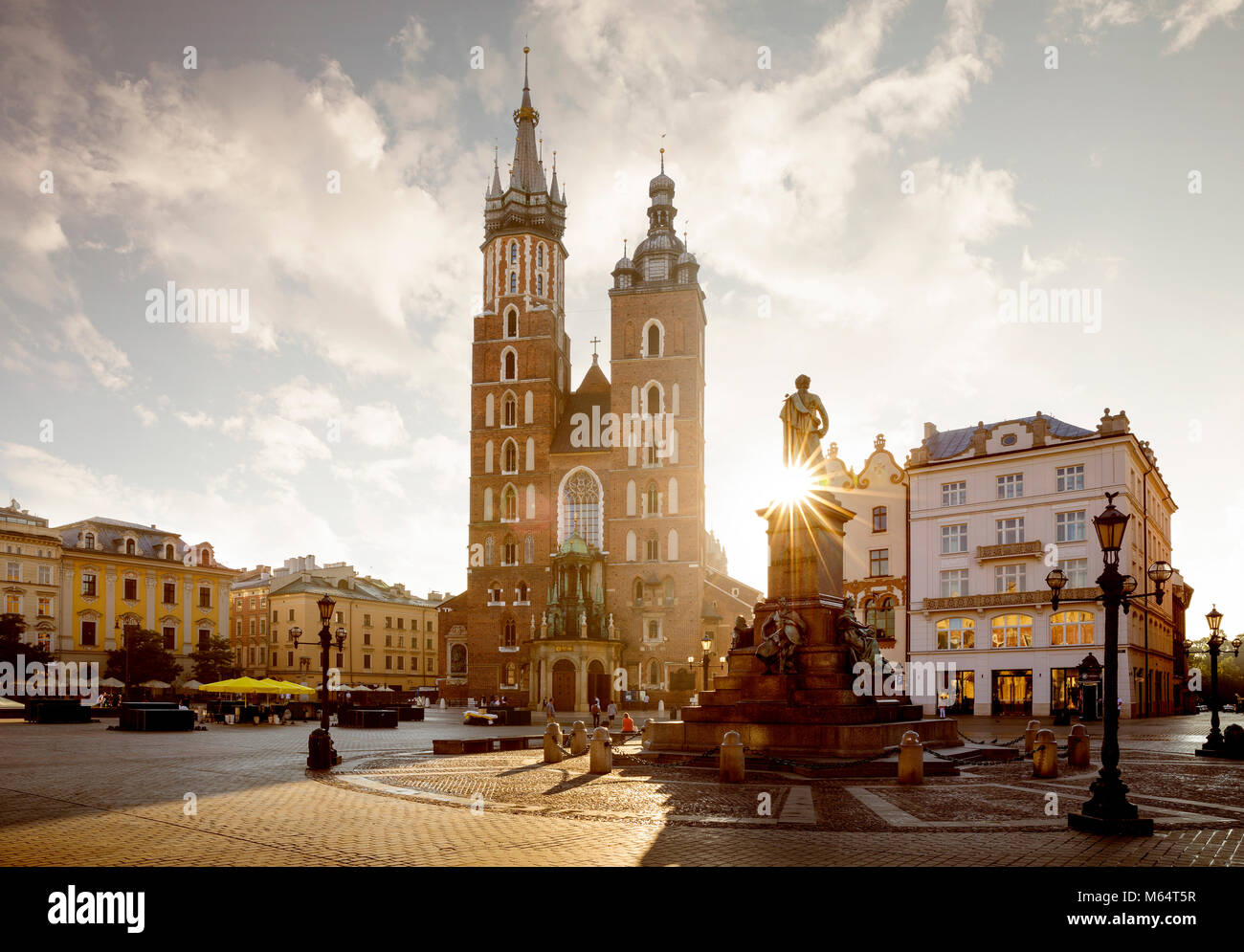 Panorama of old city center with Adam Mickiewicz monument and St. Mary's Basilica in Krakow Stock Photo