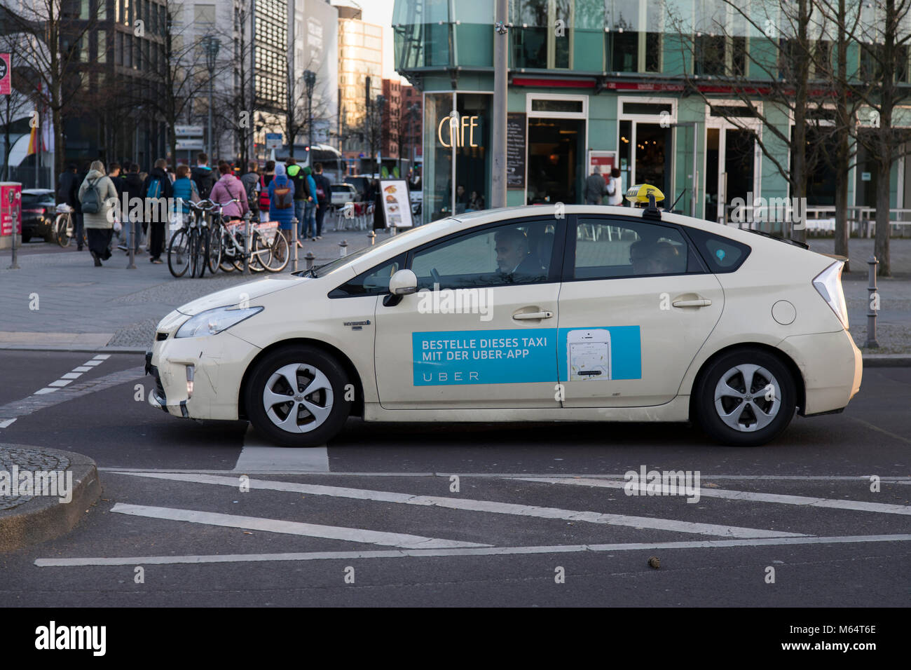Berlin, taxi with advertising for the passenger transport operator 