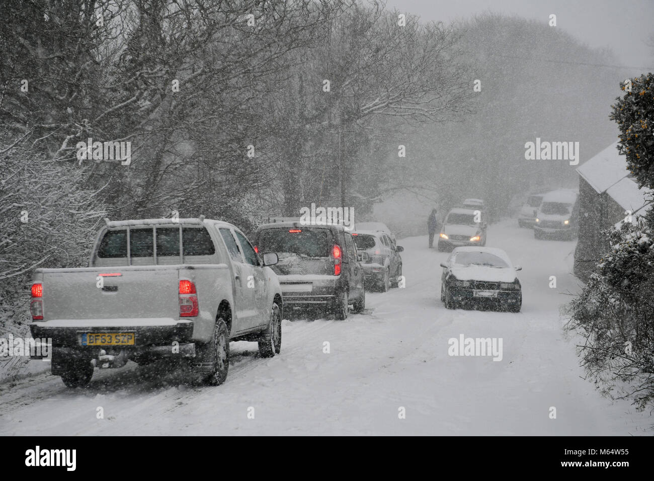 Vehicles get stuck on the A30 near Land's End in Cornwall following heavy snow that made driving conditions difficult. Stock Photo