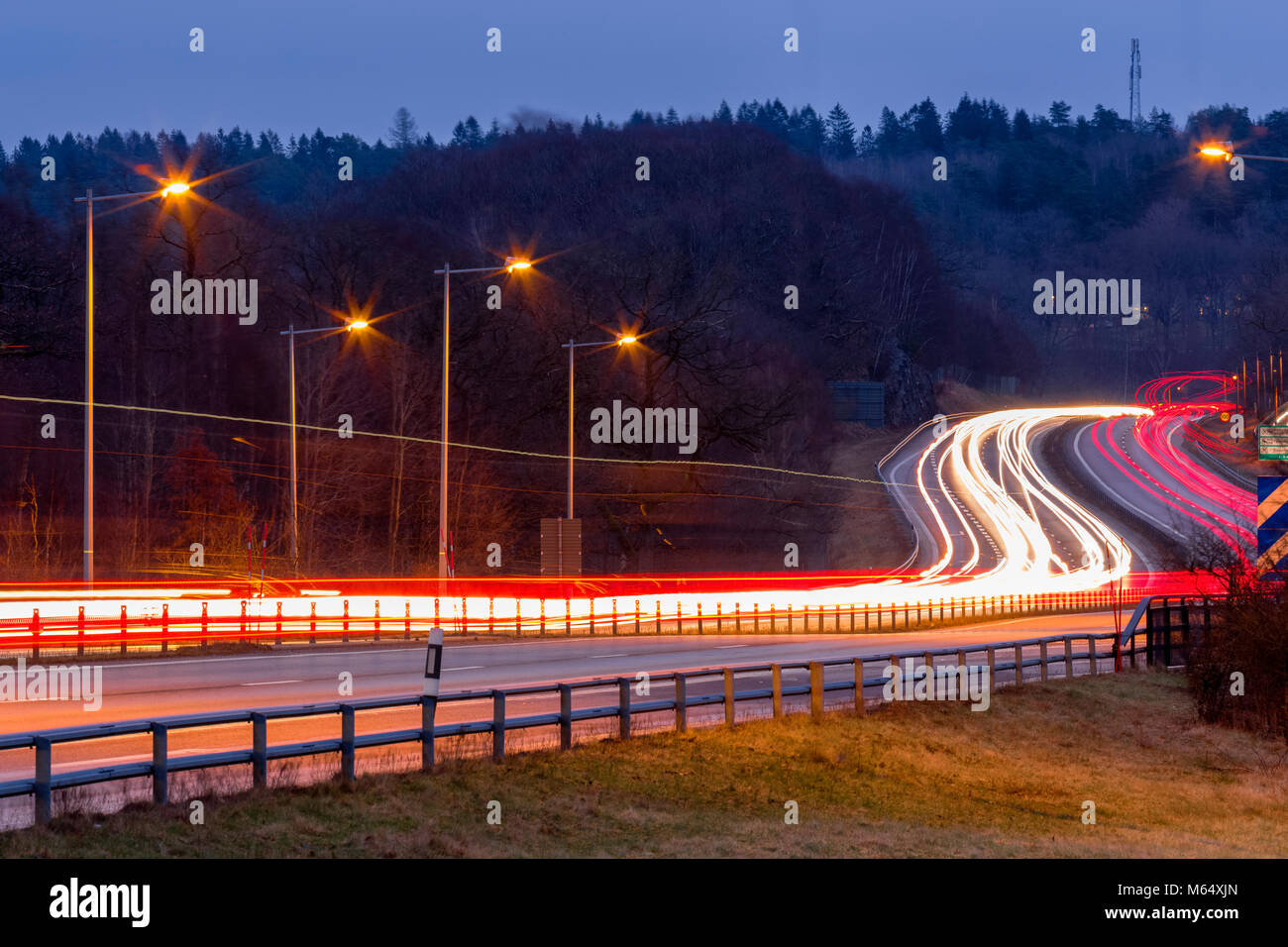 Long exposure light trails from motorway traffic  Model Release: No.  Property Release: No. Stock Photo