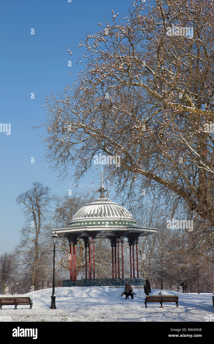 Snow on Clapham Common and the Clapham Common Bandstand. Stock Photo