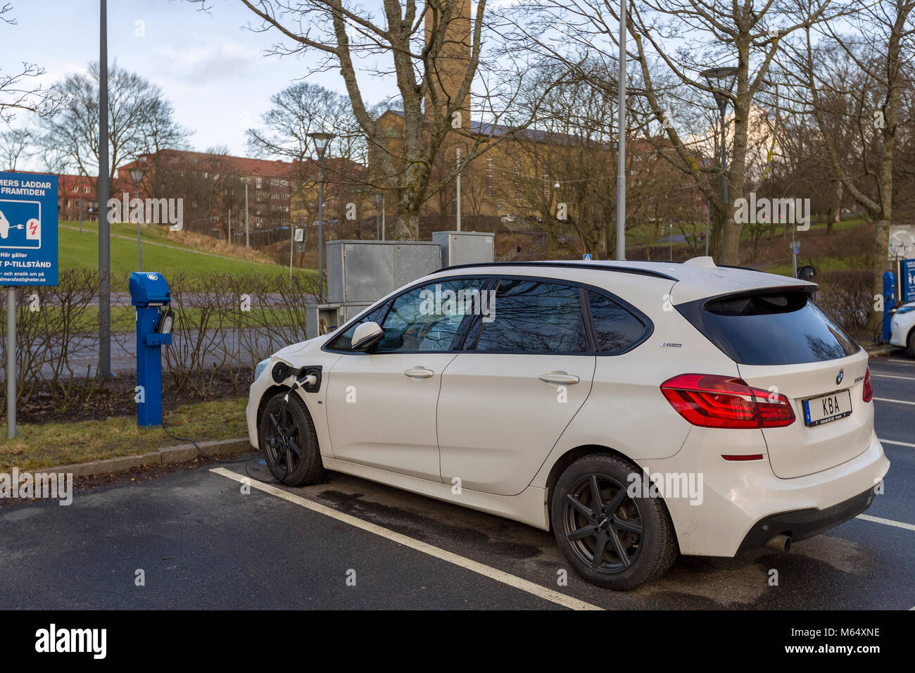 GOTHENBURG, SWEDEN - JANUARY 27 2018: Electric BMW car plugged into charging station, Chalmers University of Technology, Gothenburg, Sweden  Model Release: No.  Property Release: No. Stock Photo