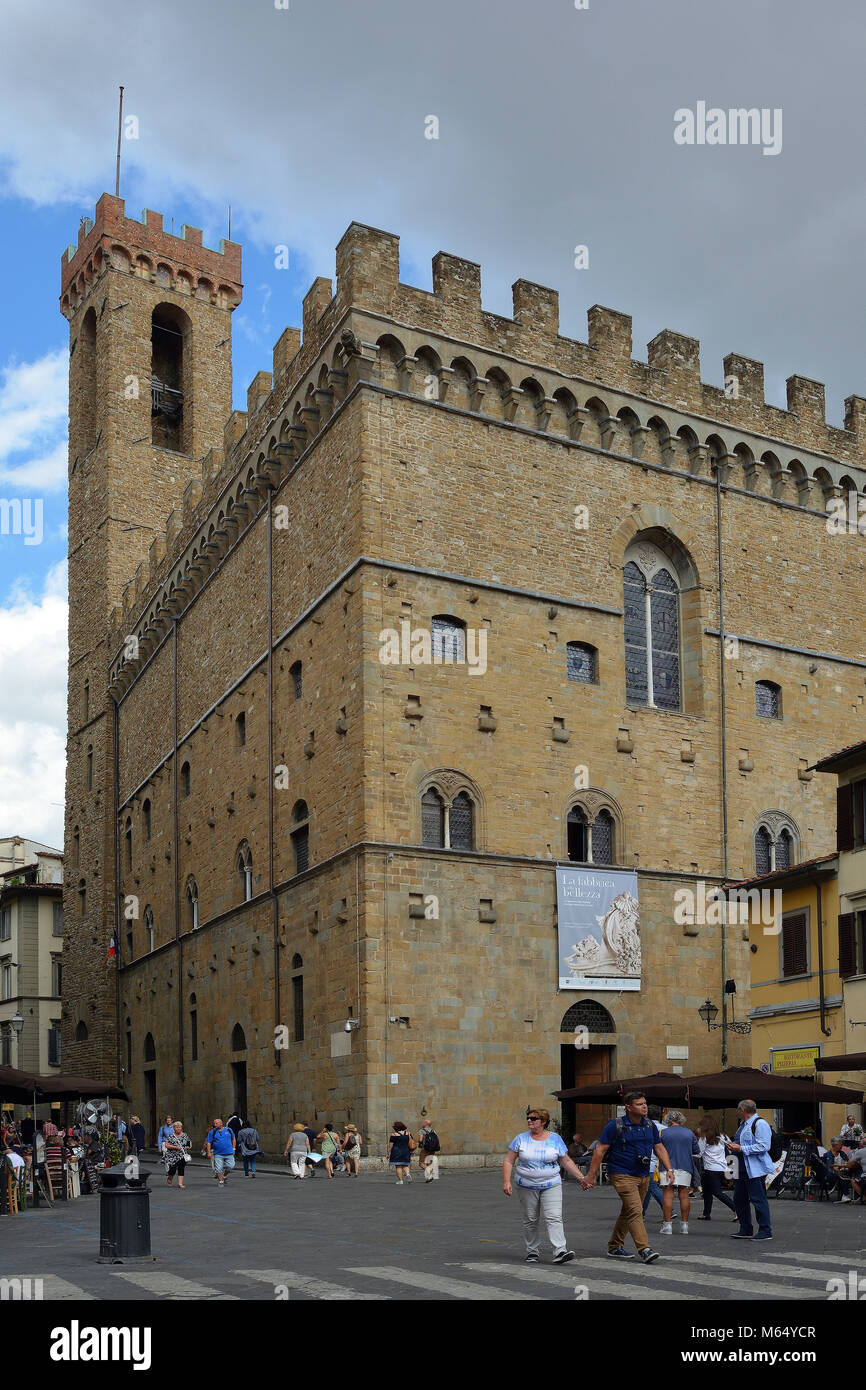 Museo nazionale del Bargello in Florence with Pedestrians in the Piazza San Firenze - Italy. Stock Photo