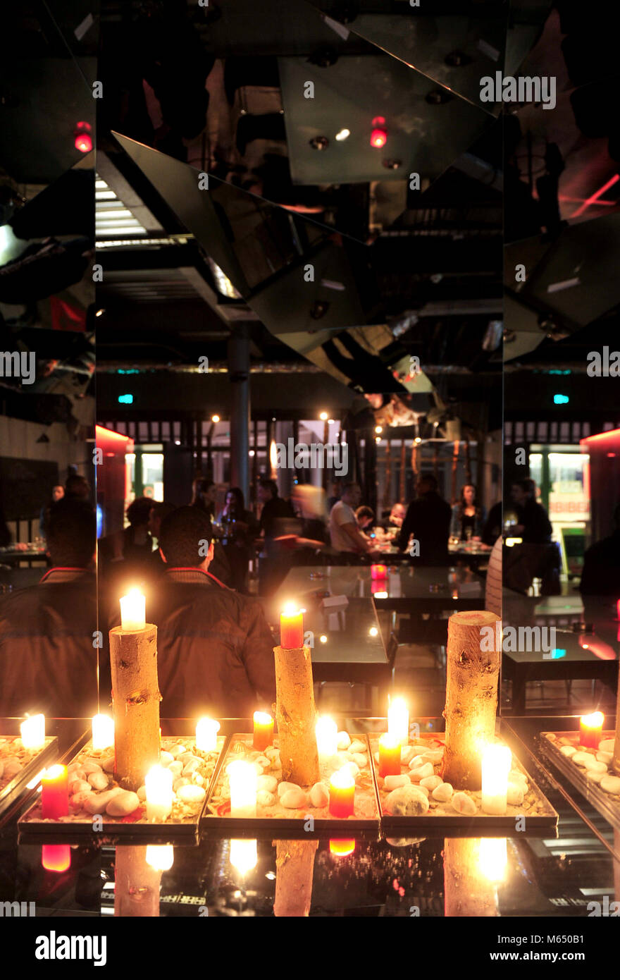 Interior of dark modern restaurant with candles Stock Photo