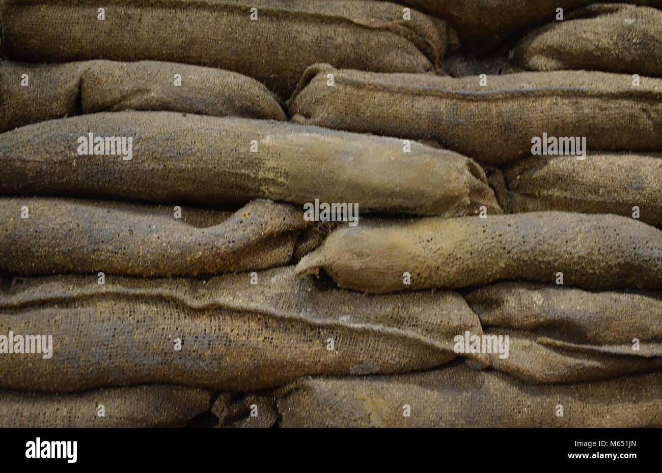A stack of British wartime hessian sandbags Stock Photo