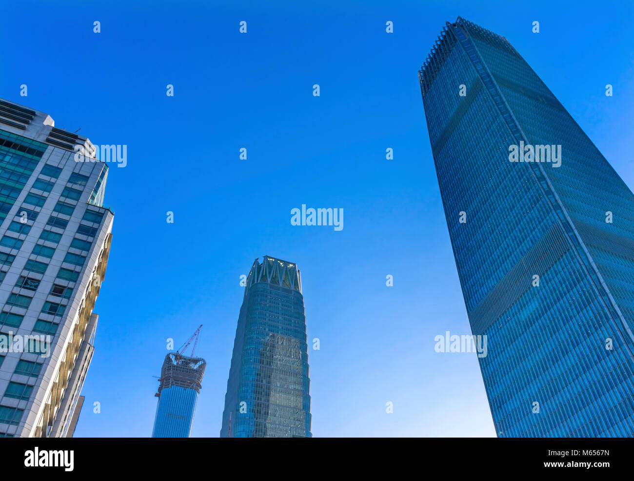 Three Big Skyscrapers China World Trade Center Z15  Towers Old Apartment Building Old New Contrast Guamao Central Business District Beijing China Stock Photo
