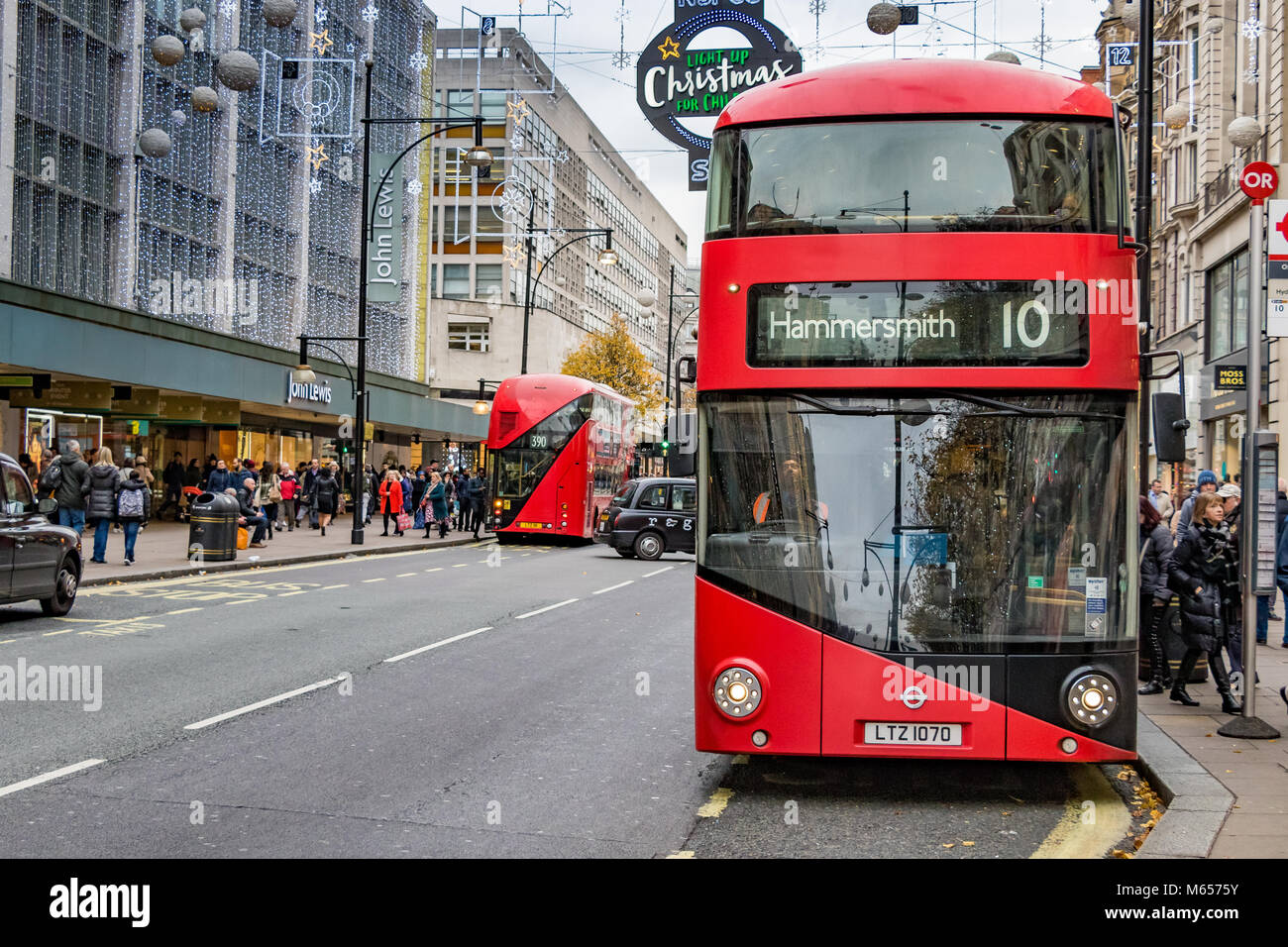No 10 Bus to Hammersmith at a bus stop on London's Oxford St ,the No 10 bus route was withdrawn from service in November, 2018 Stock Photo