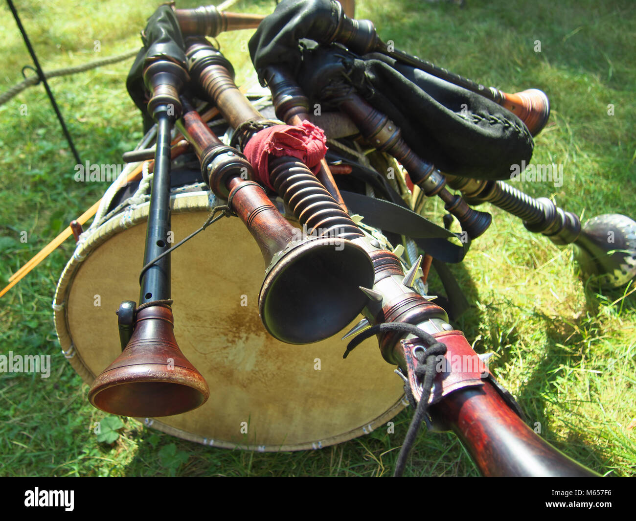 The composition of musical instruments bagpipes lying on a drum Stock