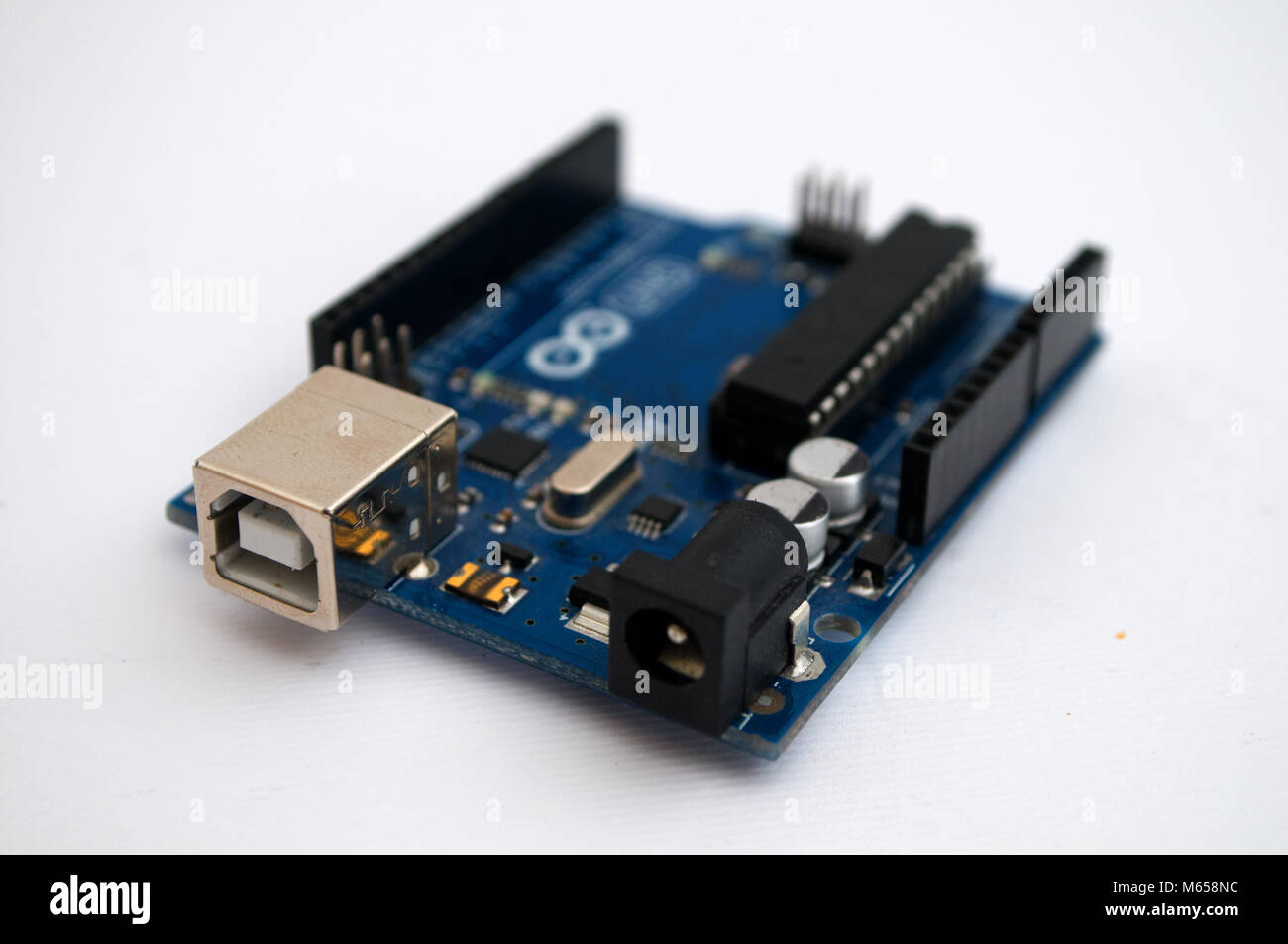 Arduino on a white background Stock Photo - Alamy