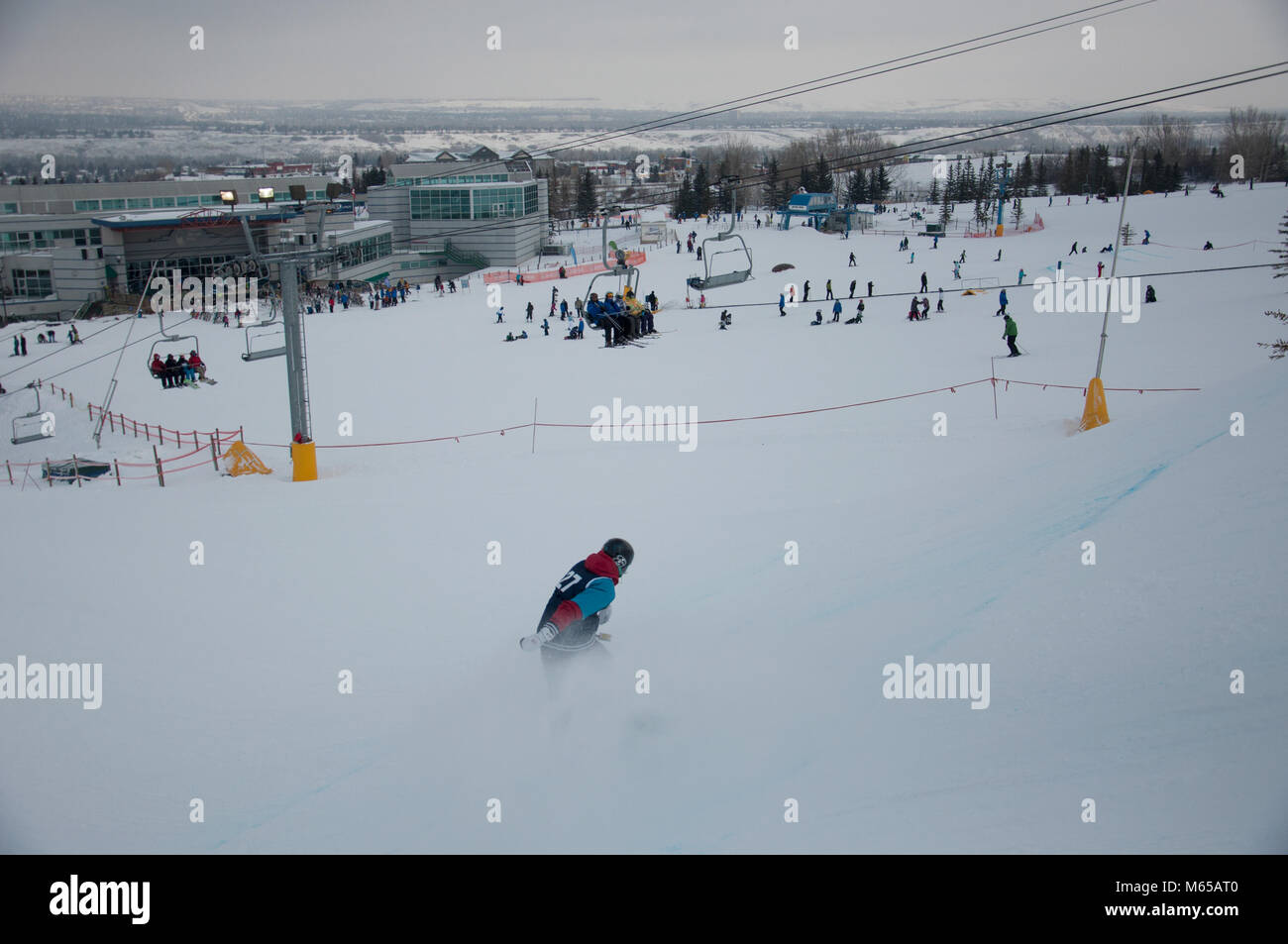 Junior Snowboarder on the slopes of Canada Olympic Park, now Winsport, Calgary, Alberta, Canada Stock Photo