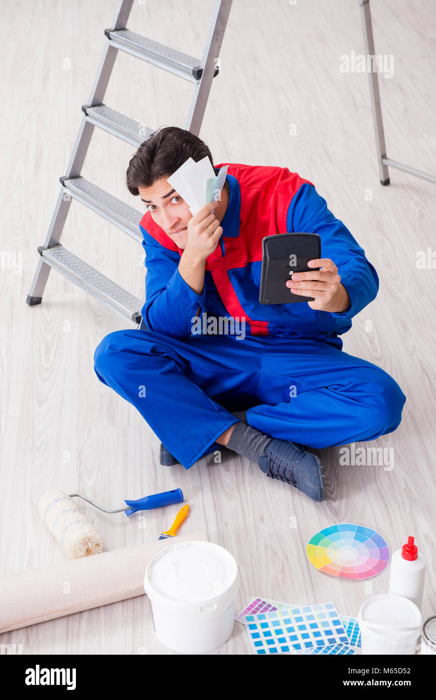 Young painter trying to match colours for painting job Stock Photo Alamy
