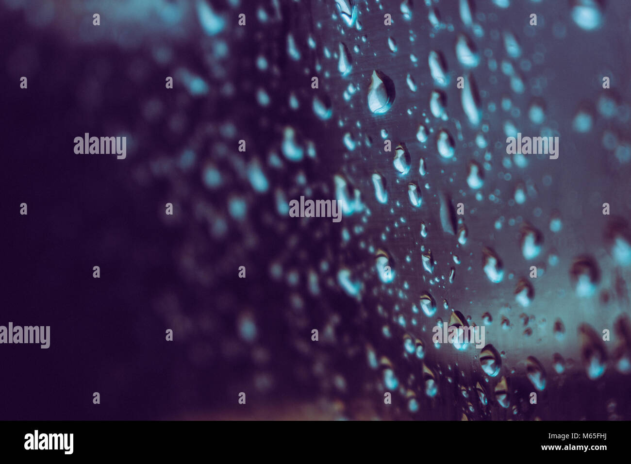 Drops. Raindrops on the car window. Macro. Stock Photo