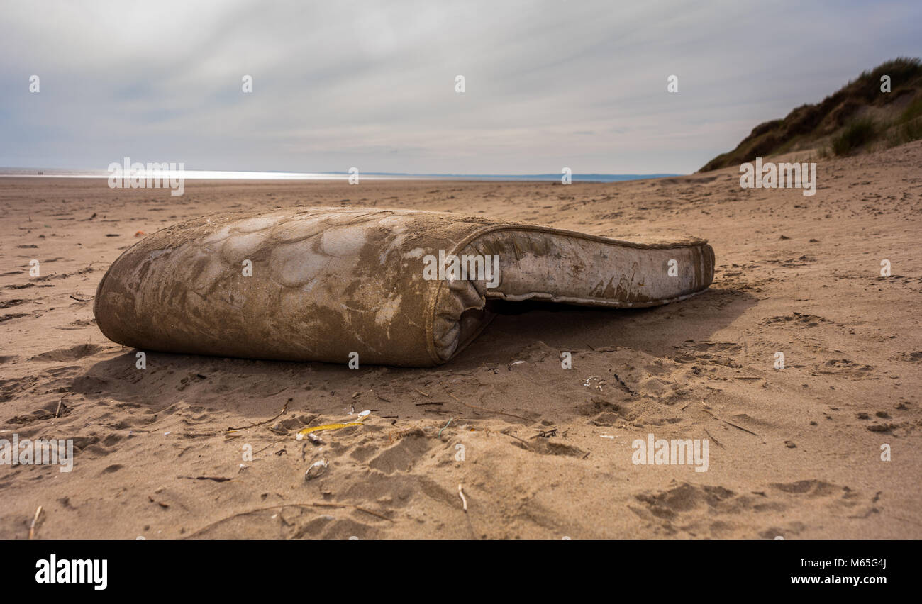 Detritus, plastics and rubbish washed up on Cefn Sidan beach, Pembrey