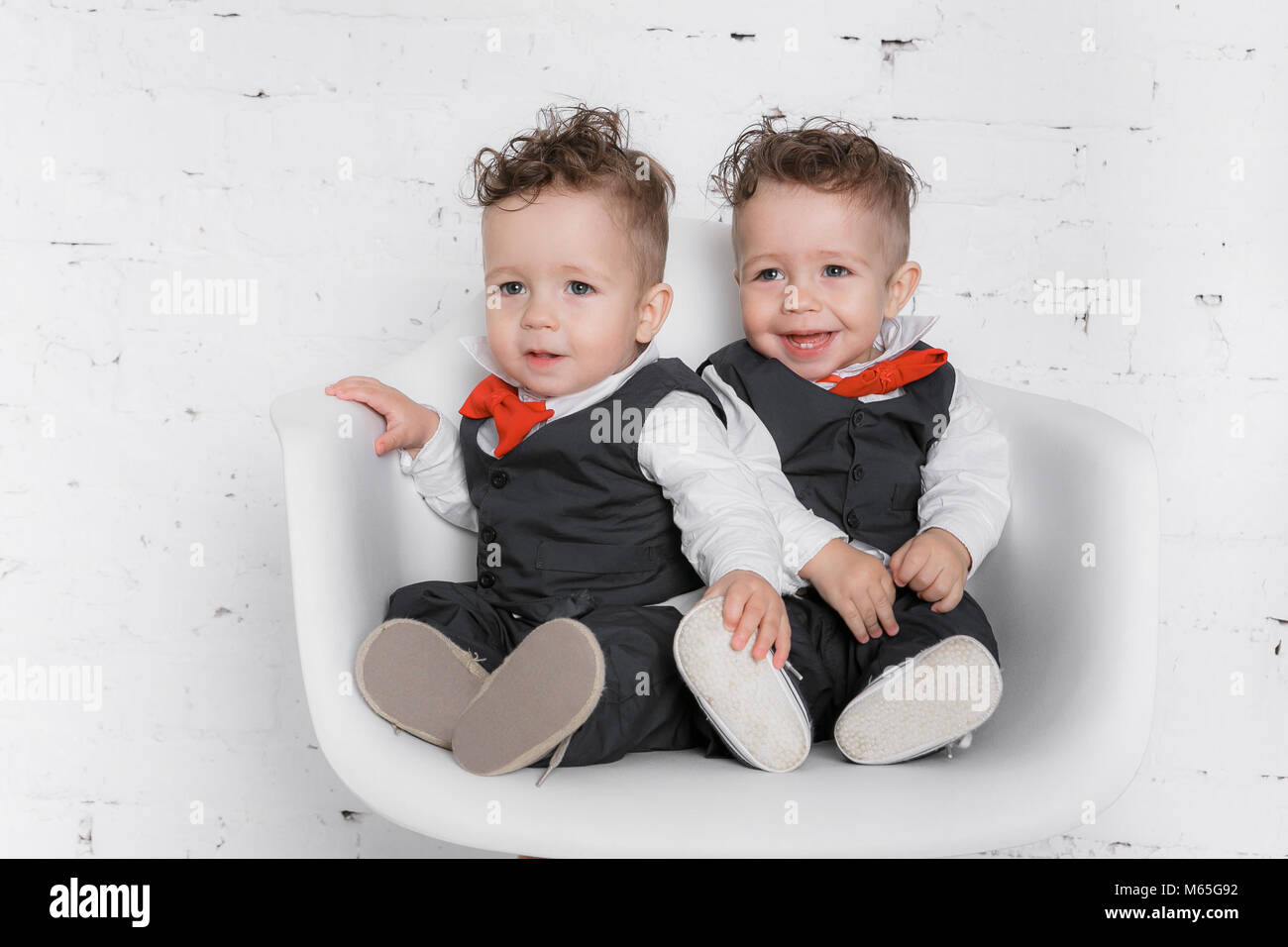 Twin baby boys Stock Photo