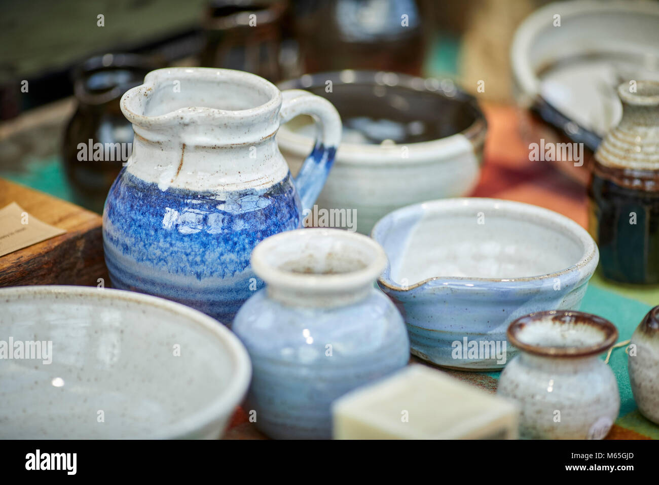 Antique ceramic bowls on sale at Altrincham Market in Altrincham town centre, Cheshire. Stock Photo