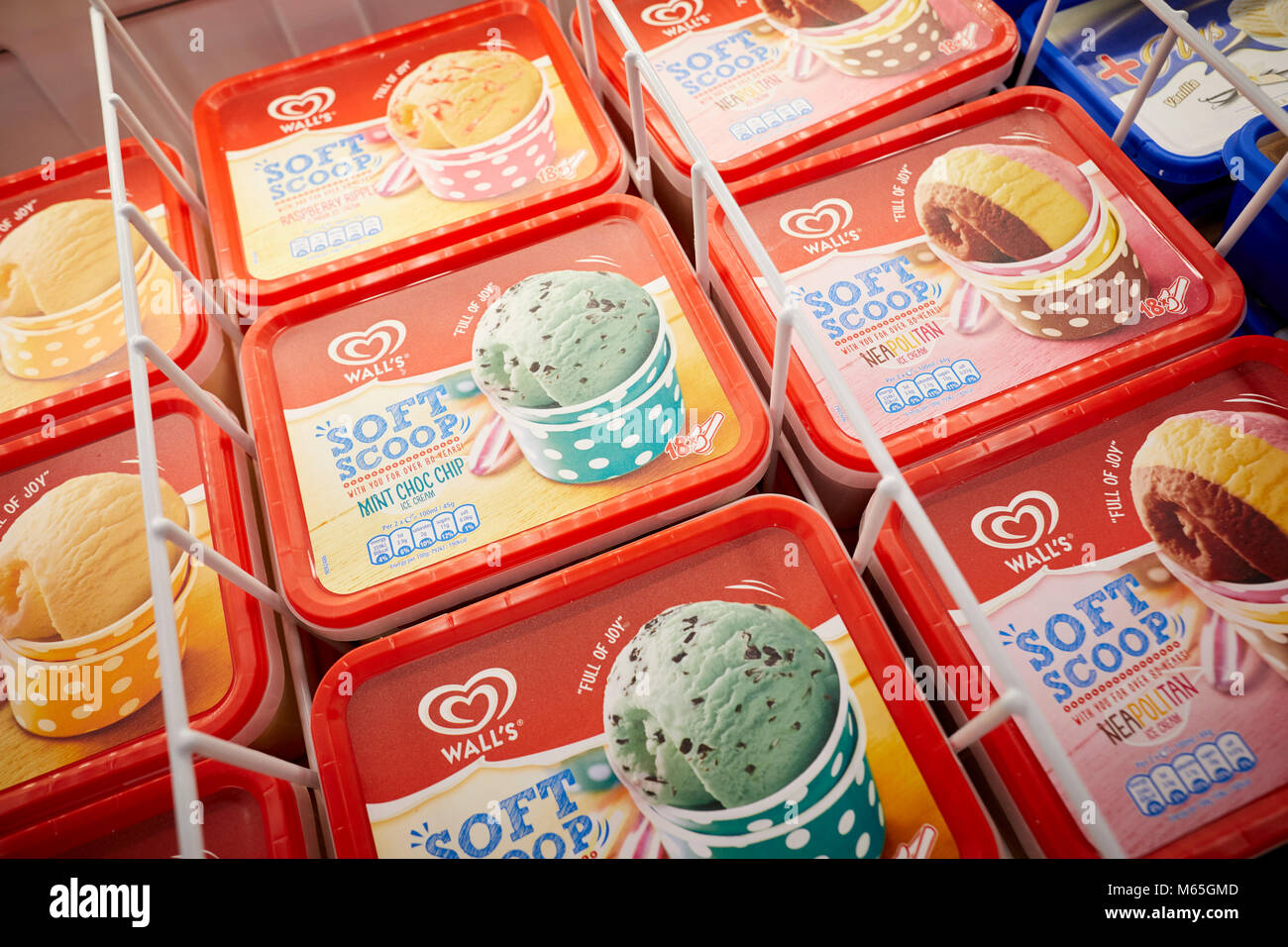 Walls ice-cream in tubs in the freezer section of shop Stock Photo