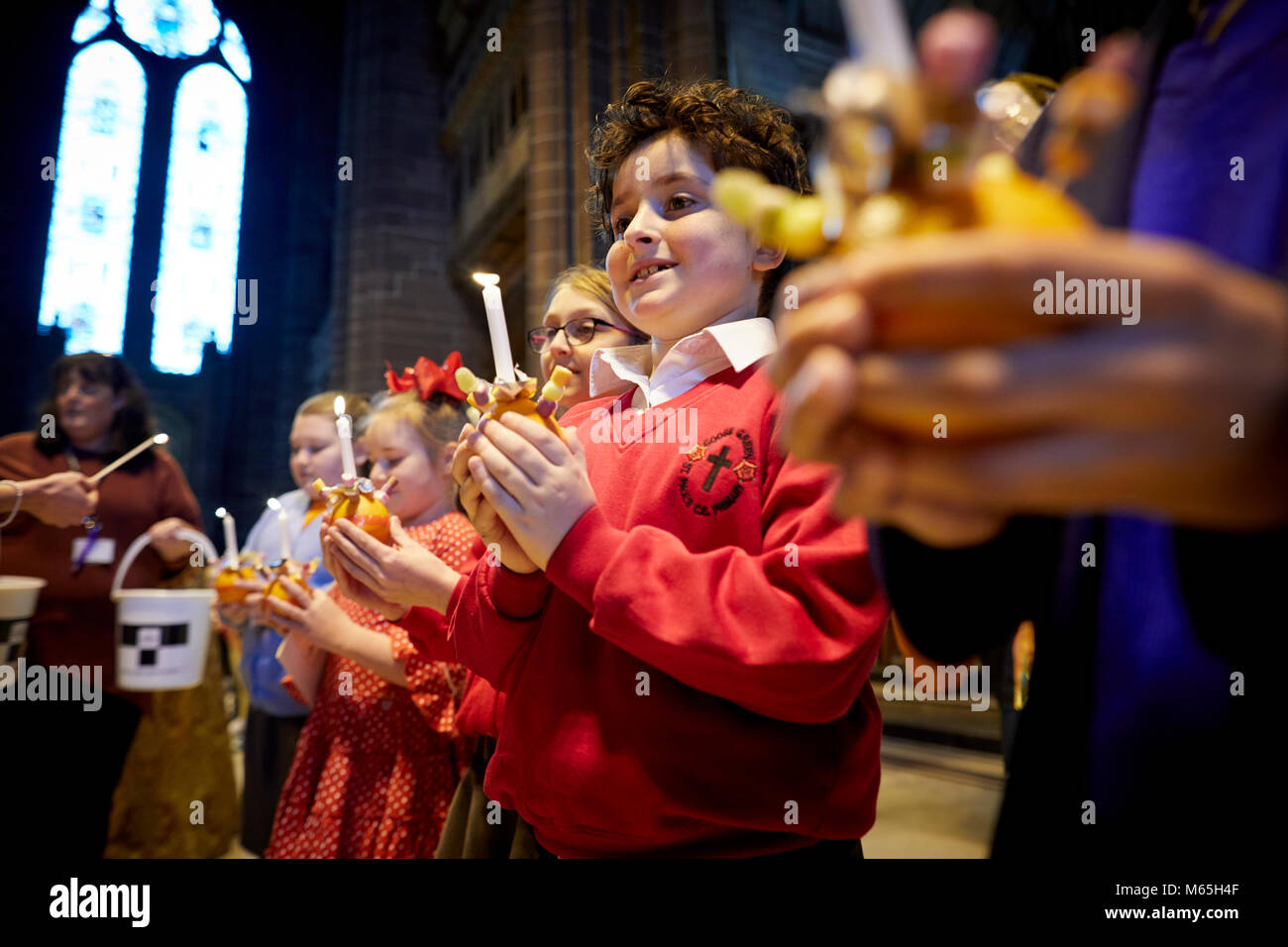 Liverpool Cathedral  Christingle Service with local school children. Stock Photo