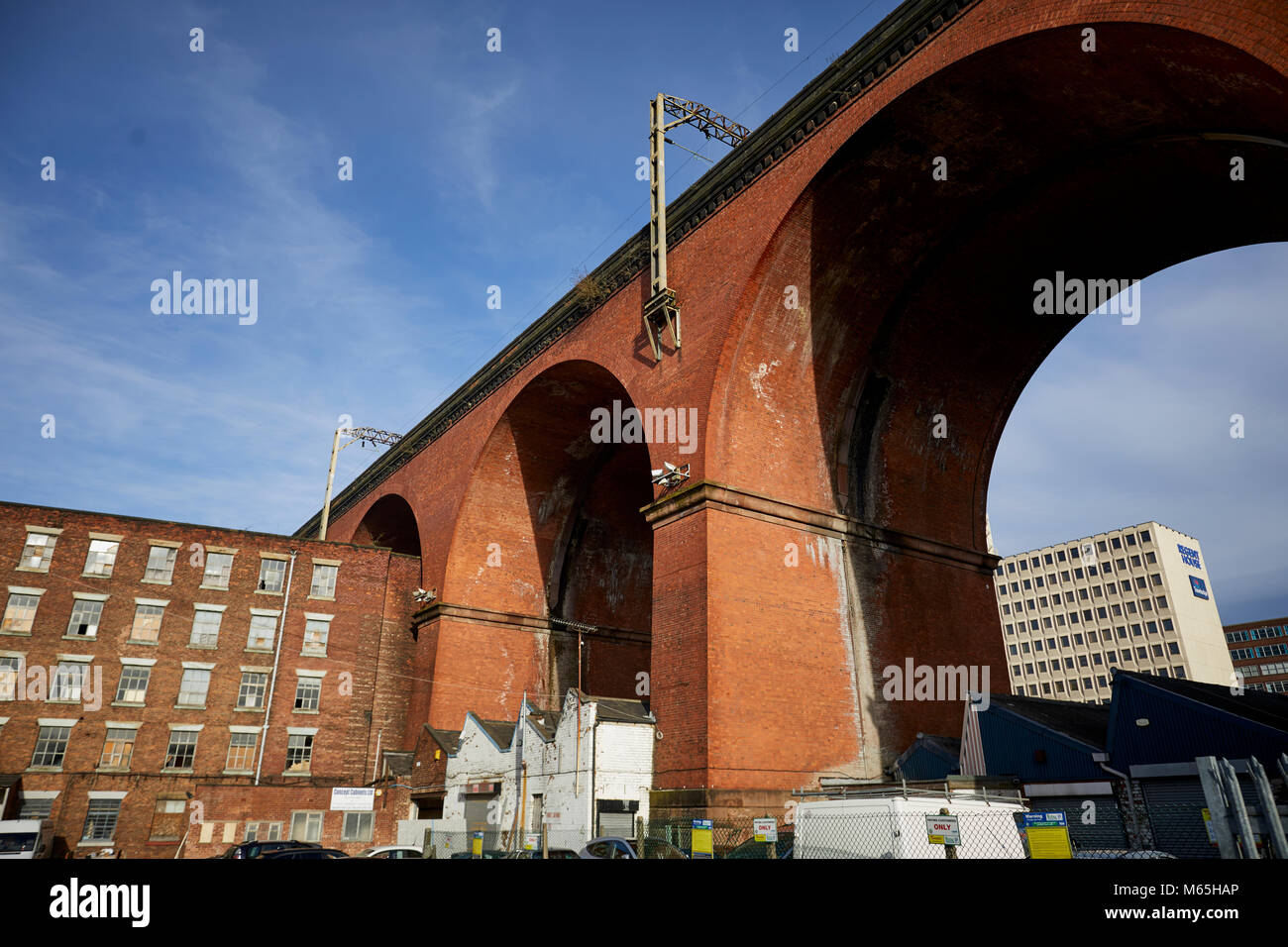 Wear Mill or Weir Mill in Stockport. The former cotton mill stands under the Stockport Viaduct Stock Photo