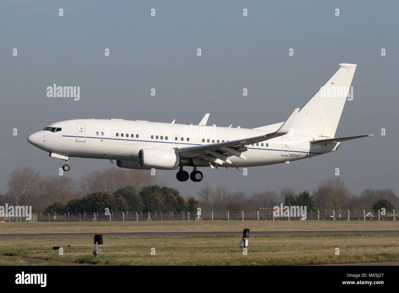 USAFE Boeing C-40B Clipper from the 86th Airlift WIng at Ramstein Germany on the approach into RAF Mildenhall. The aircraft is used for military VIPs. Stock Photo