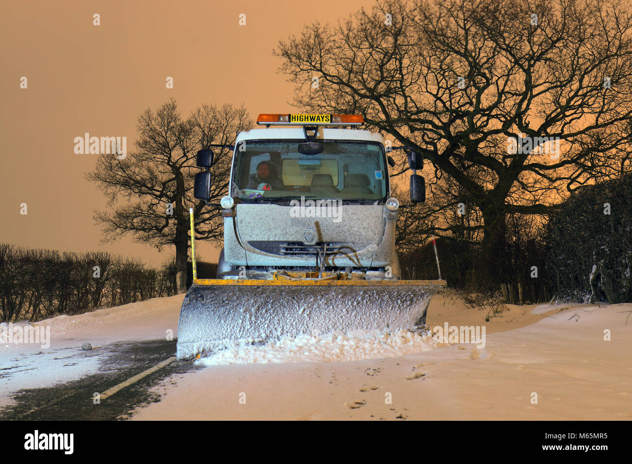 Snow Plough & Gritter in the early hours in Leeds Stock Photo