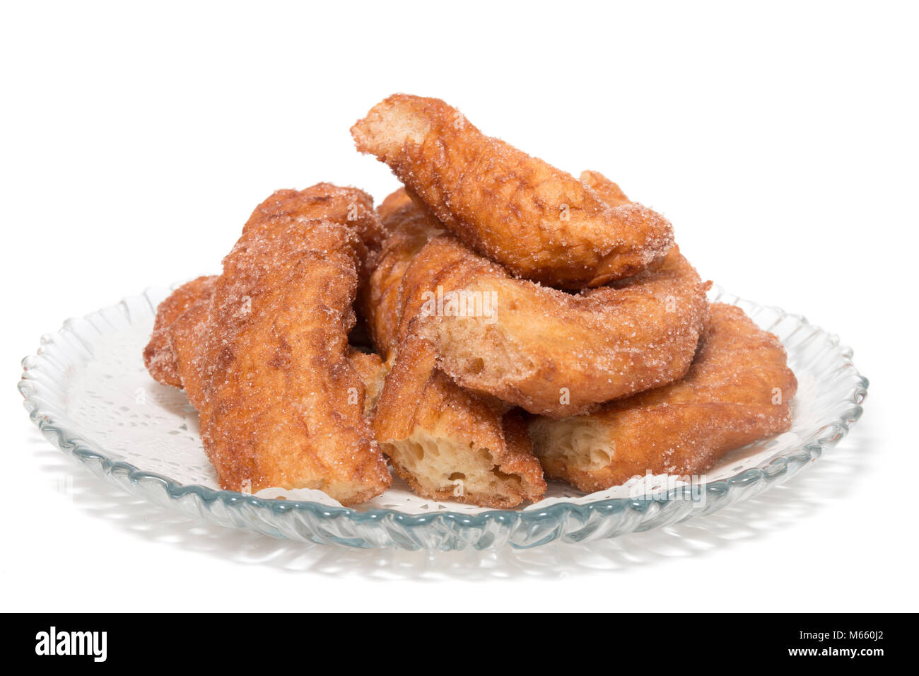 Portuguese Farturas or Spanish Churros, Fried dough sticks isolated on