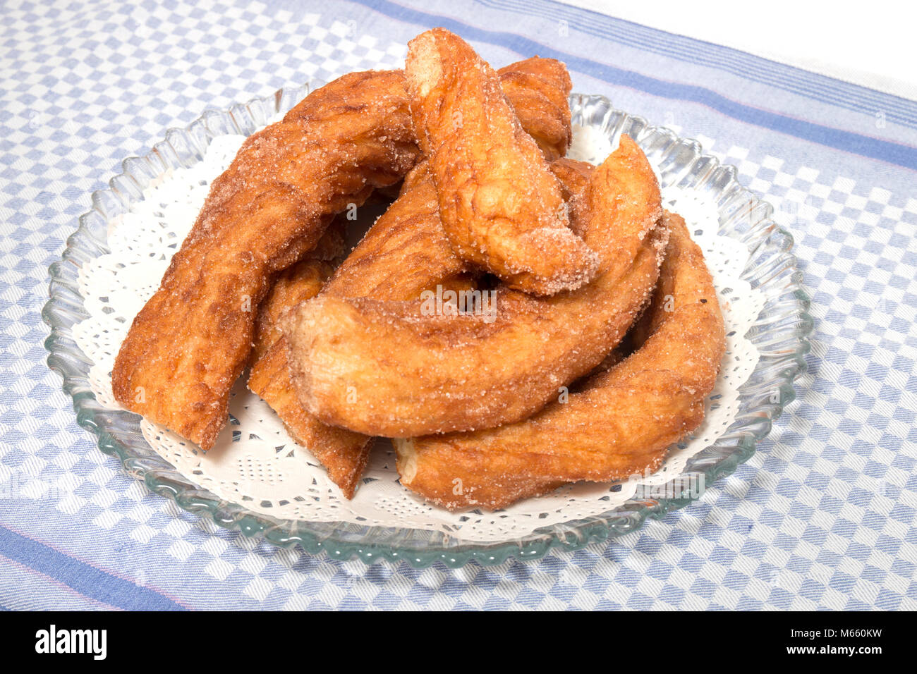 Portuguese Farturas or Spanish Churros, Fried dough sticks on a table cloth  Stock Photo - Alamy