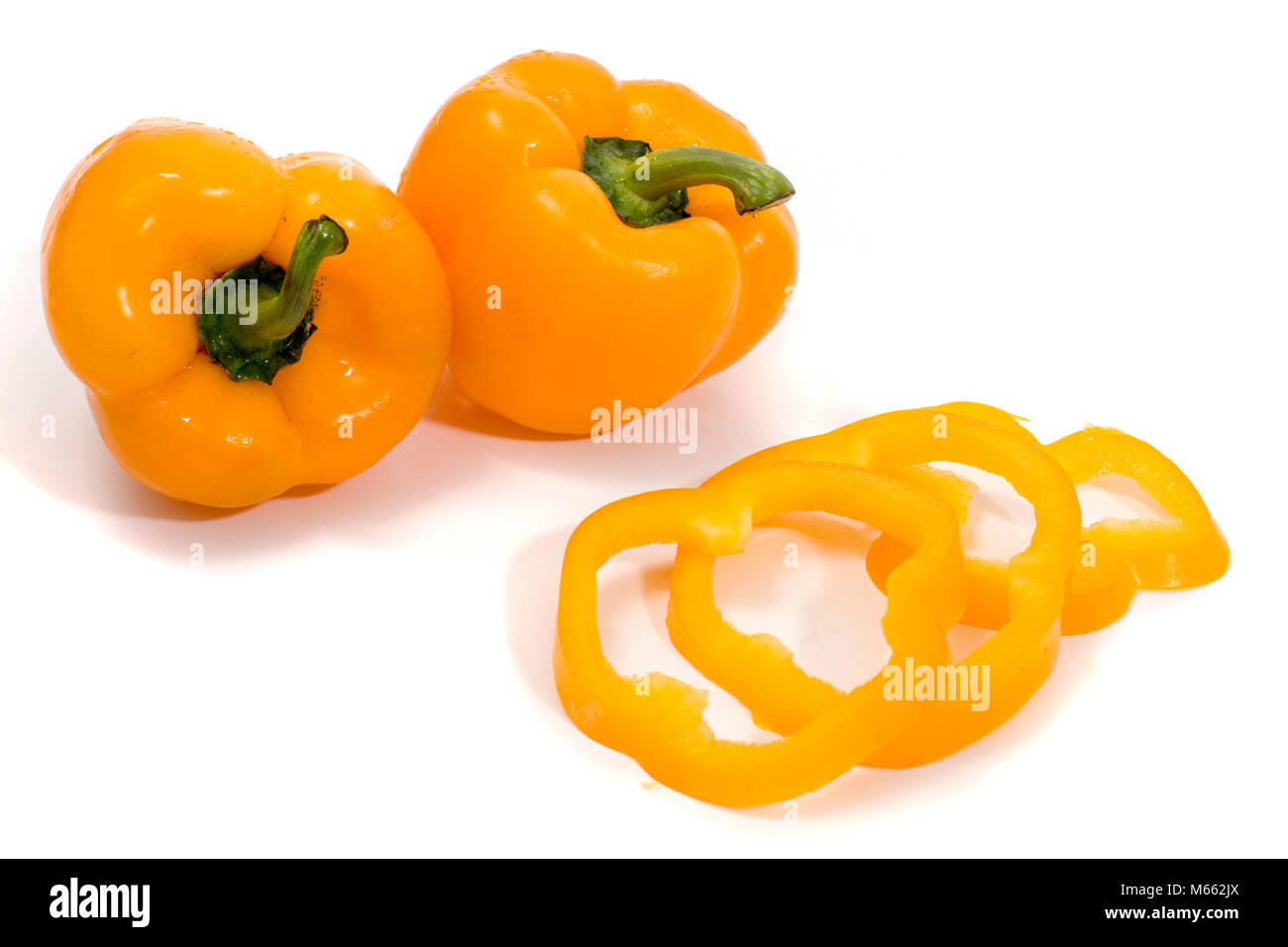 yellow bell peppers isolated on a white background Stock Photo - Alamy