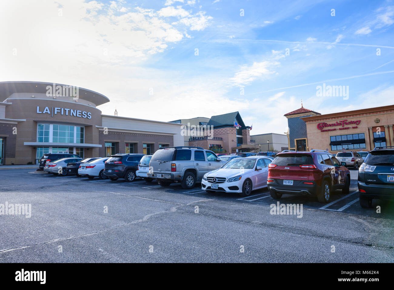 STERLING, VIRGINIA / USA - January 31, 2018: A section of Dulles Town Center showing LA Fitness gym, the Cheesecake factory restaurant and cars parked Stock Photo