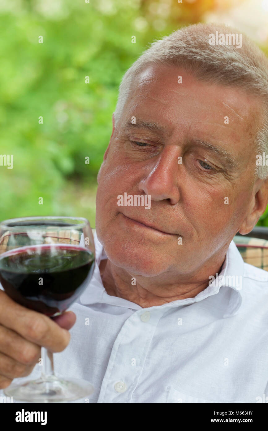 Mature handsome man with a glass of wine Stock Photo