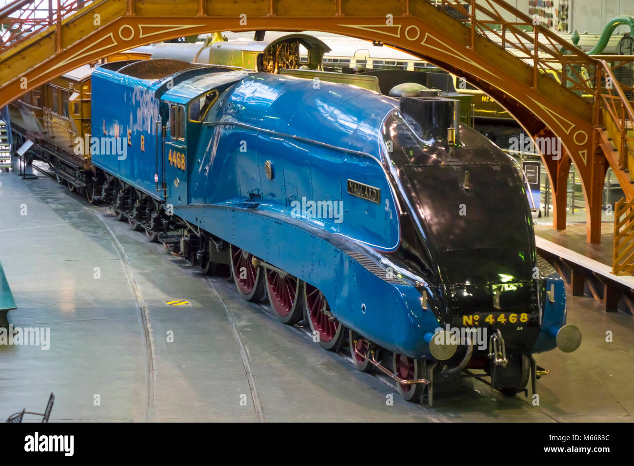 View of the Great Hall at the National Railway Museum York with streamlined steam locomotive Mallard world speed record holder for steam train Stock Photo