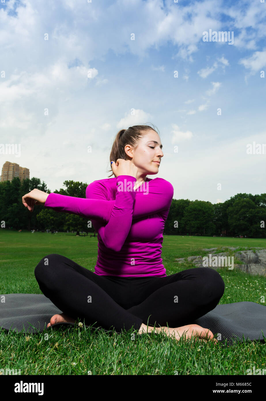 Young Caucasian Woman Practices Yoga In 
