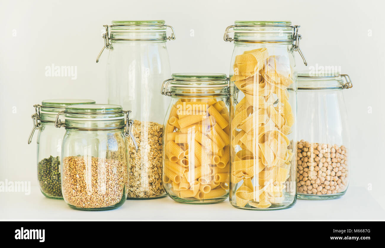 Uncooked cereals, grains, beans and pasta in jars Stock Photo Alamy