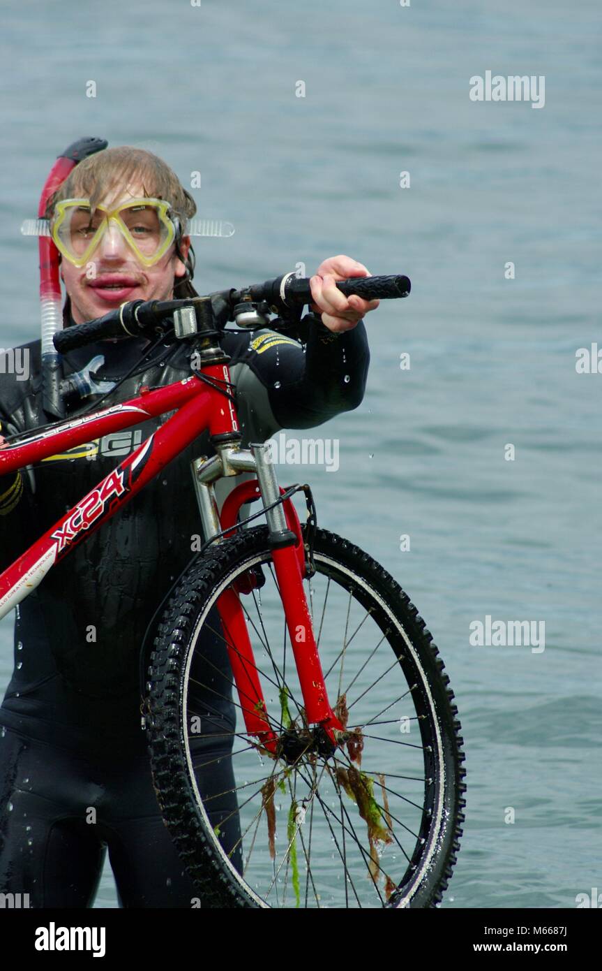 Young Male Snorkeller in Wetsuit Exploring the Submarine World of Beach,