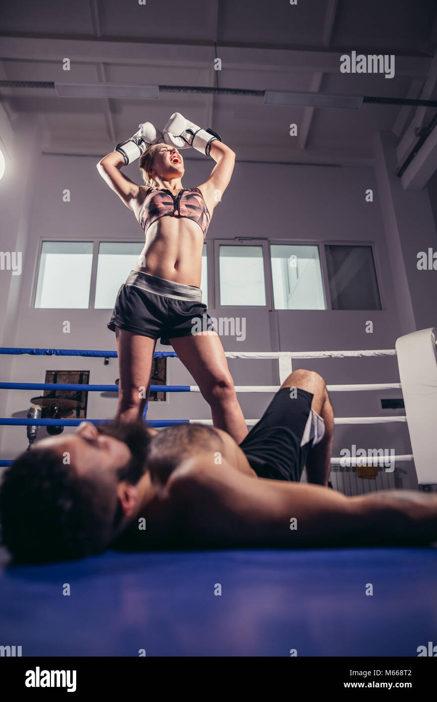 Man, Boxer Winner and Champion after Fight in Gloves on Black Background  Celebraiting Flawless Victory. Fitness and Stock Photo - Image of health,  muscular: 163897408