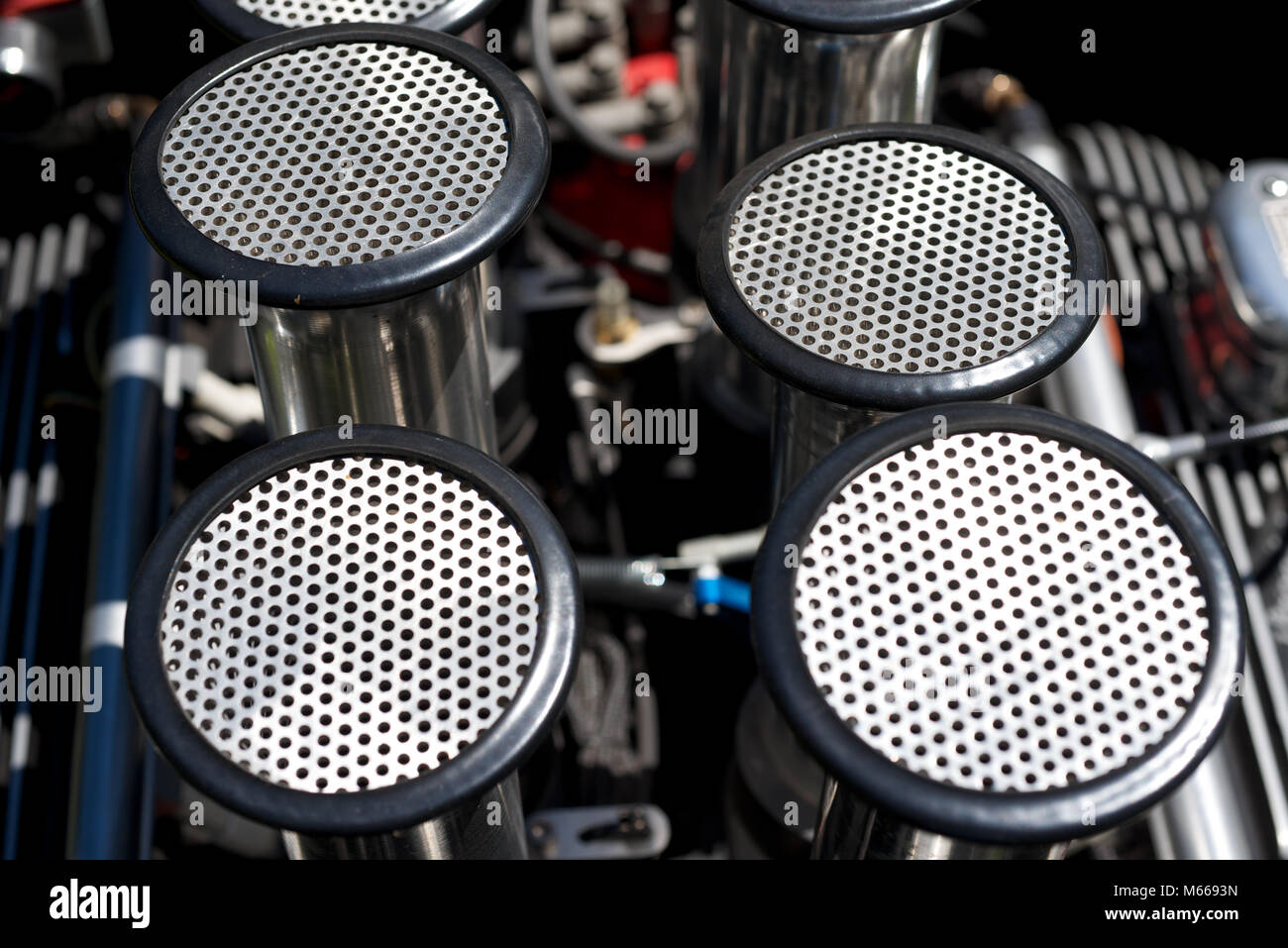 Trumpet air intakes installed on a Hot Rod engine Stock Photo Alamy