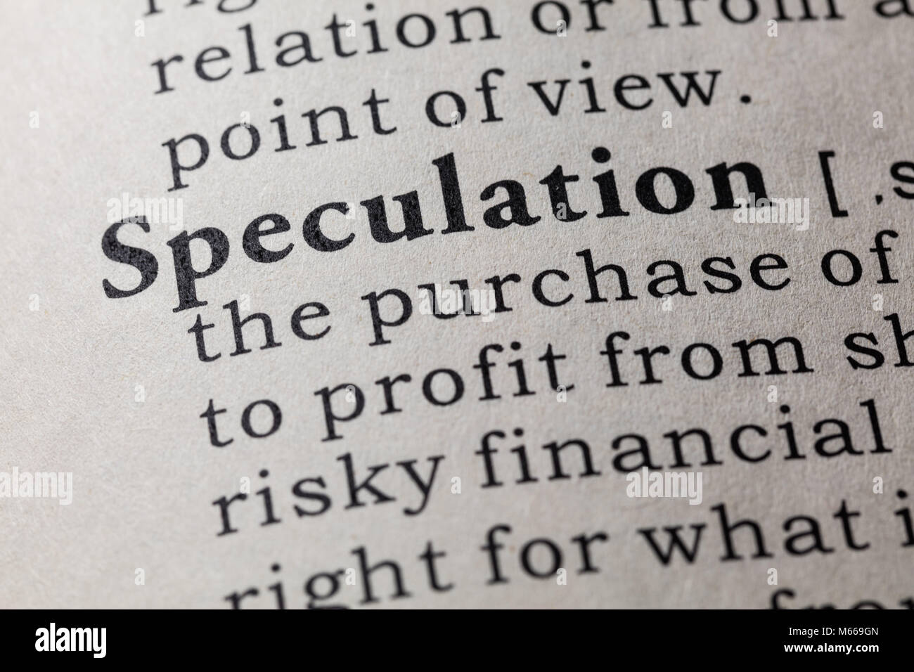 Fake Dictionary, Dictionary definition of the word speculation. including key descriptive words. Stock Photo