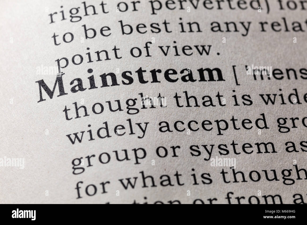 Fake Dictionary, Dictionary definition of the word mainstream. including key descriptive words. Stock Photo