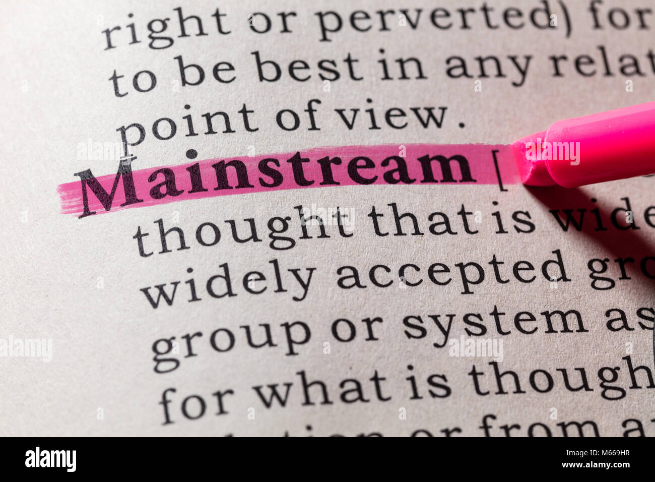 Fake Dictionary, Dictionary definition of the word mainstream. including key descriptive words. Stock Photo