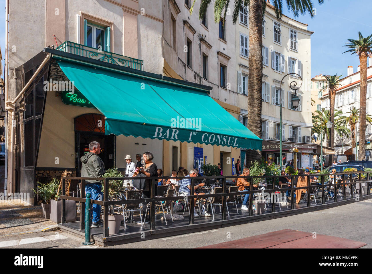 People outside a bar in Ajaccia, Corsica, France Stock Photo