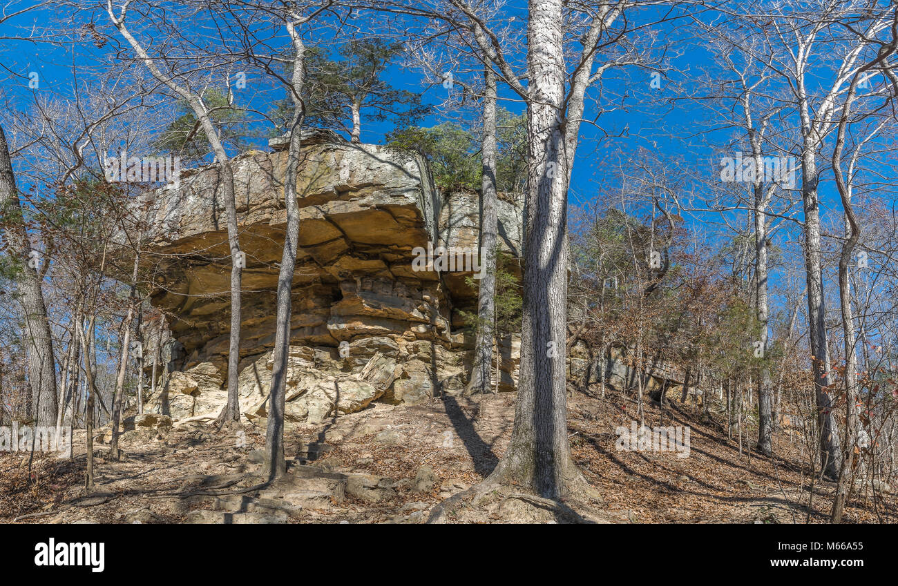 An enormous rock outcropping in the appalachian mountain foothills of north Mississippi Stock