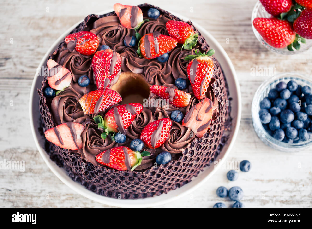 Chocolate cake strawberries blueberries hi-res stock photography and ...
