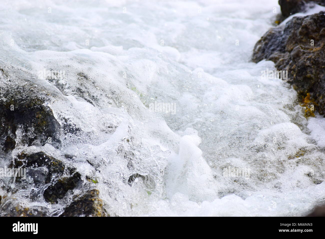 Water Splashing Against The Rocks Stock Photo Alamy Water Splashing Against The Rocks M66NN3