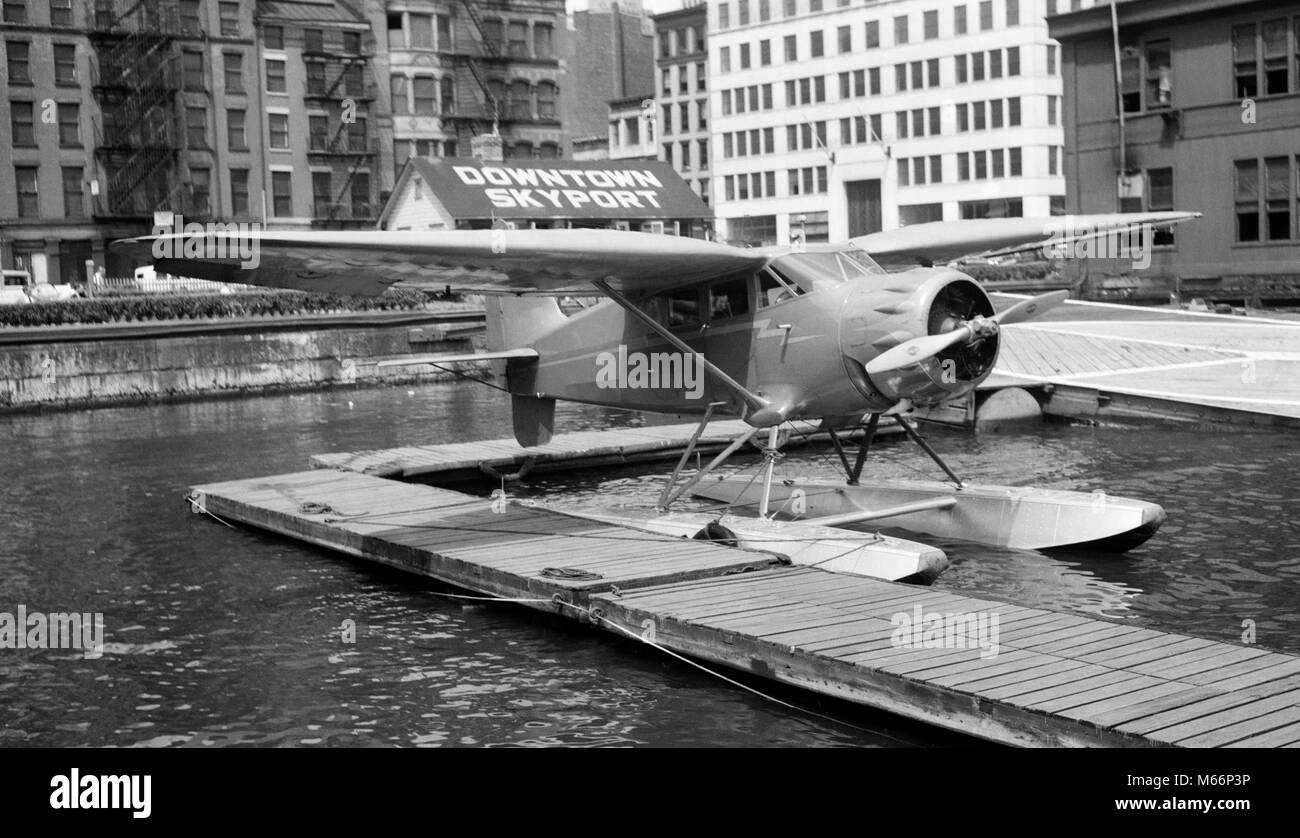 1930s 1939 WACO AIRPLANE ON FLOATS IN EAST RIVER AT WALL STREET