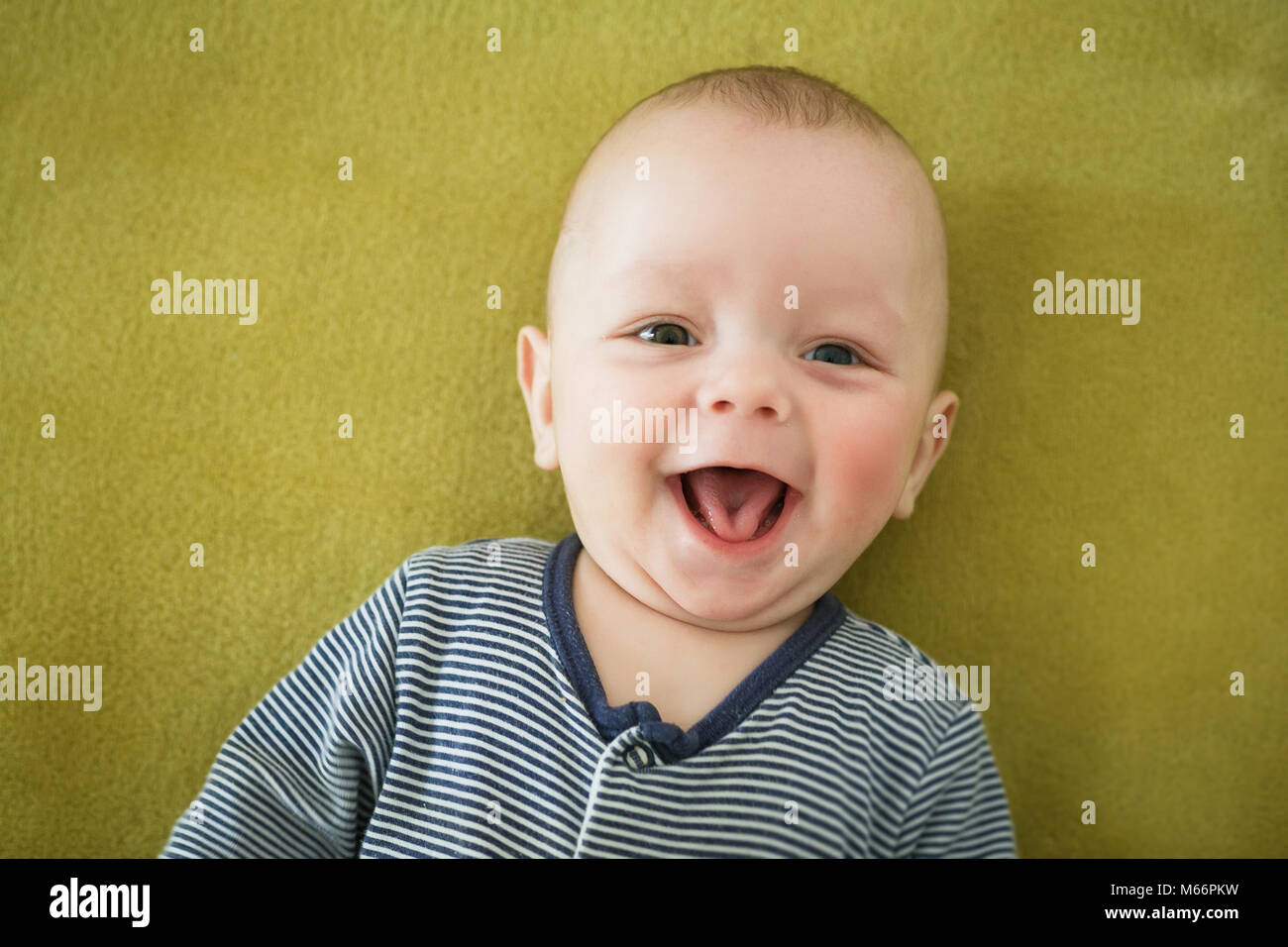 Portrait of  newborn boy is lying in the bed Stock Photo