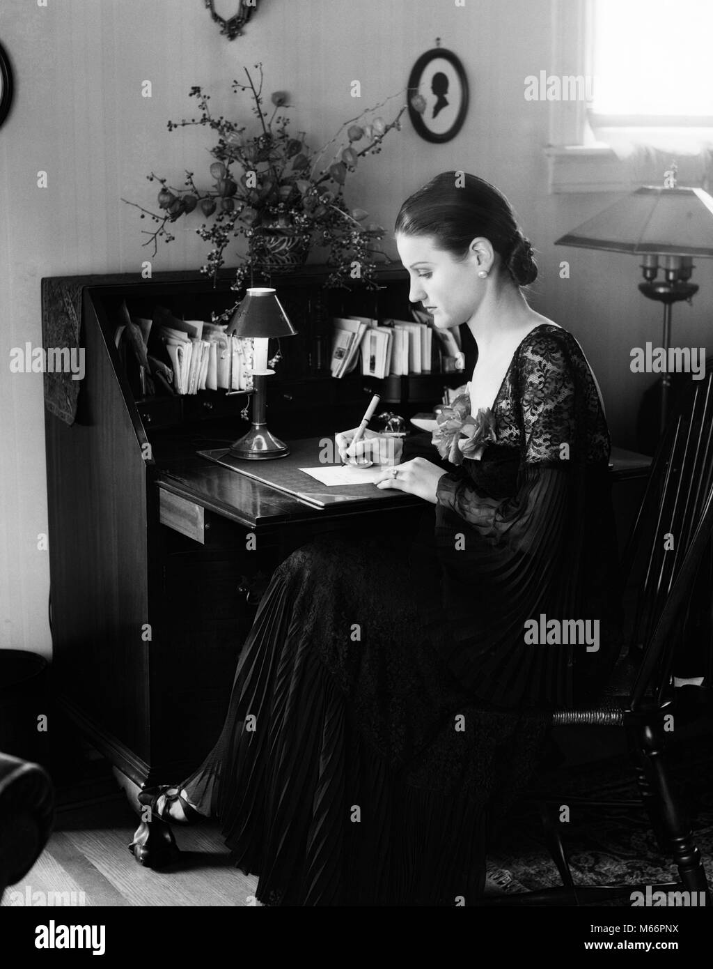 1930s Woman Sitting At Desk Writing Letter S5868 Har001 Hars