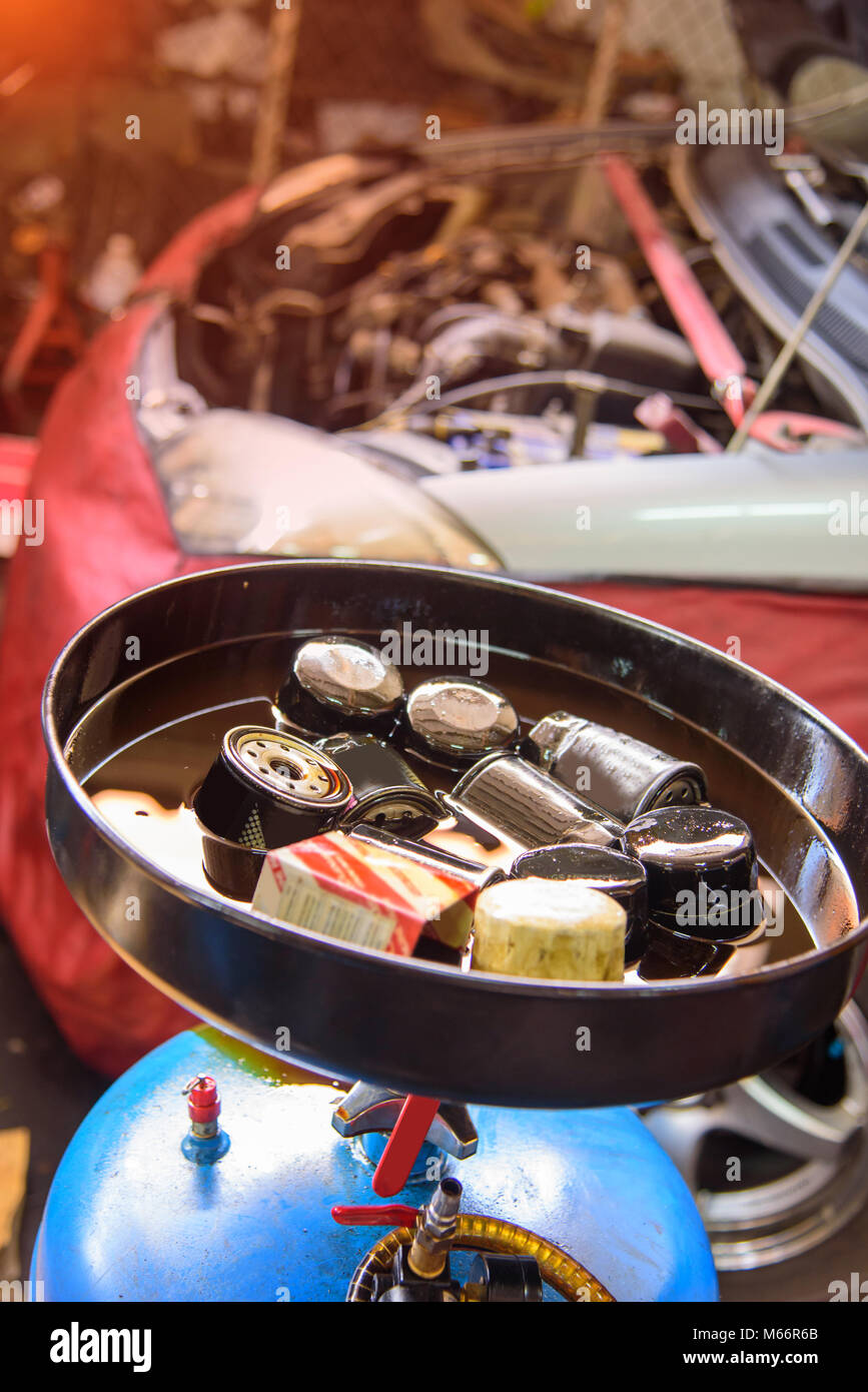 Used Oil filter in dirty oil Stock Photo Alamy