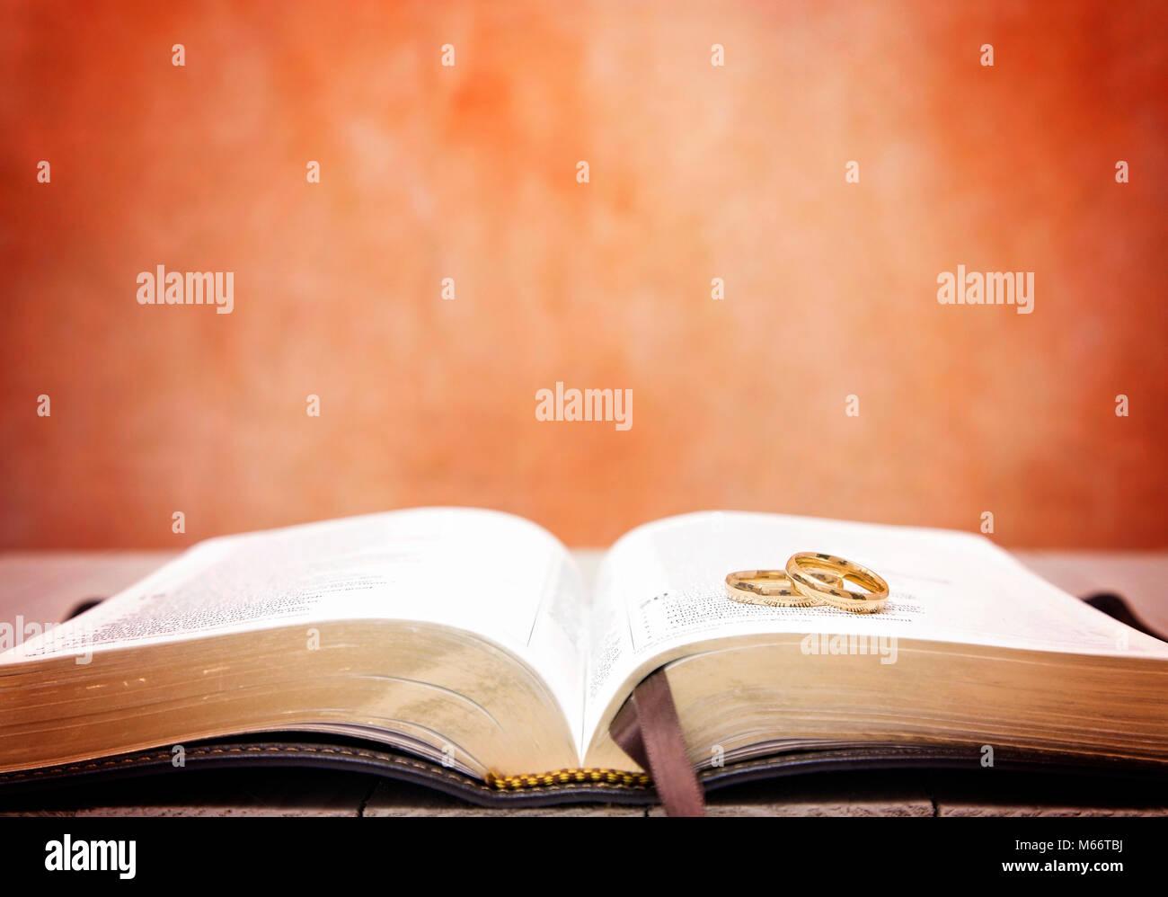 Wedding Bands on an Open Bible Stock Photo Alamy