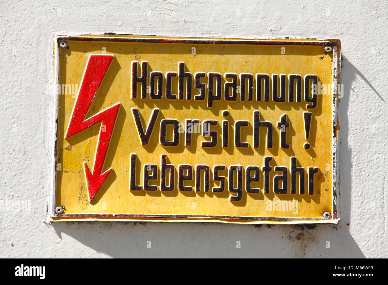 Warning sign High Voltage, mortal danger, Germany Stock Photo