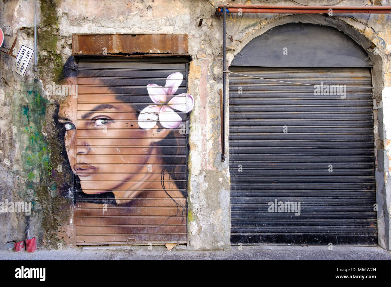 Graffiti, woman with blossom in her hair, La Vucciria district, Piazza Garraffello, Palermo, Sicily, Italy Stock Photo